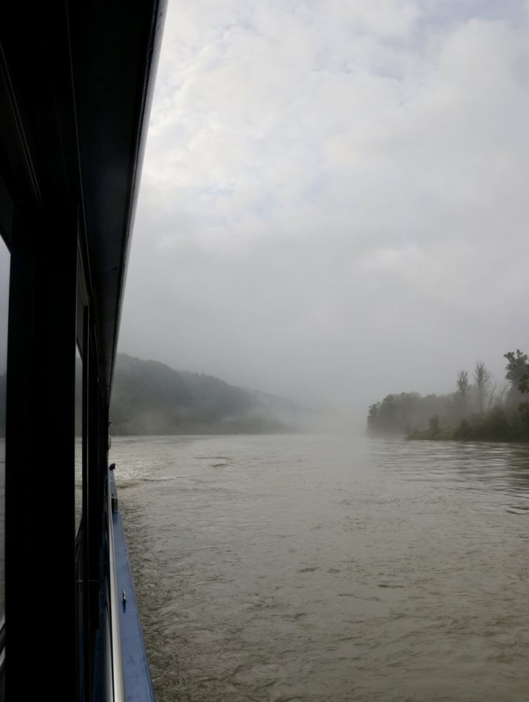 Fog-covered Danube while arriving in Passau Germany