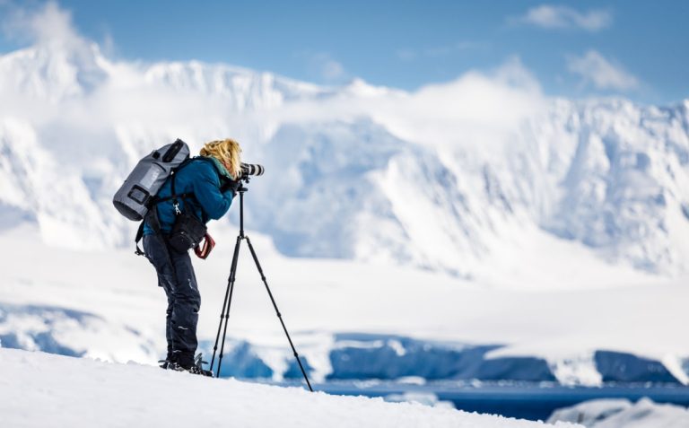 Passenger taking pictures at Damoy Island, Antarctica Copyright Max Draeger - Oceanwide Expeditions