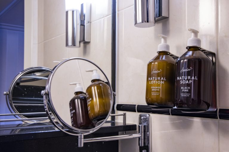 Bottles of Soeder soap and lotion in bathroom of cabin aboard river cruise ship Antonio Bellucci (Thurgau Travel) on Moselle river, near Zell (Mosel), Rhineland-Palatinate, Germany