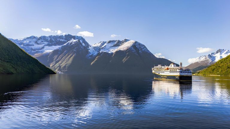 Havila Capella sails through the beautiful Hjorundfjord