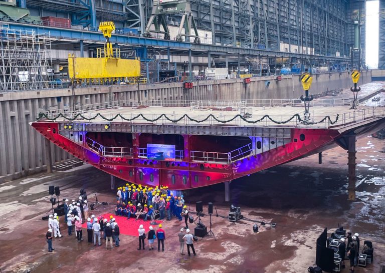 View inside the large covered dry dock of the shipyard