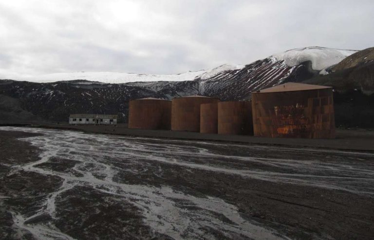 Rusty old whale oil tanks in Whalers Bay, Deception Island _ Erwin Vermeulen