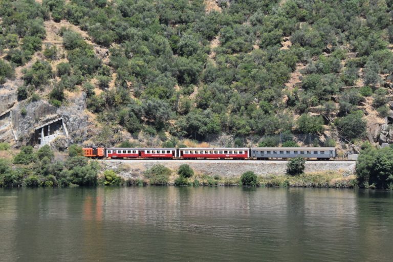 Tourist train running along the banks of the Douro