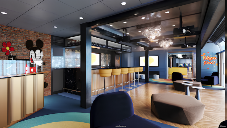 A club setting featuring a drink bar, stools, modular furnishings, a dance floor, disco balls, a large LED screen and retro Disney murals (1)