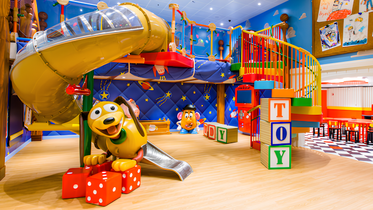 A room themed like the film Toy Story with Mister Potato Head, Slinky Dog and a structure to climb through_Oceaneer Club (1)