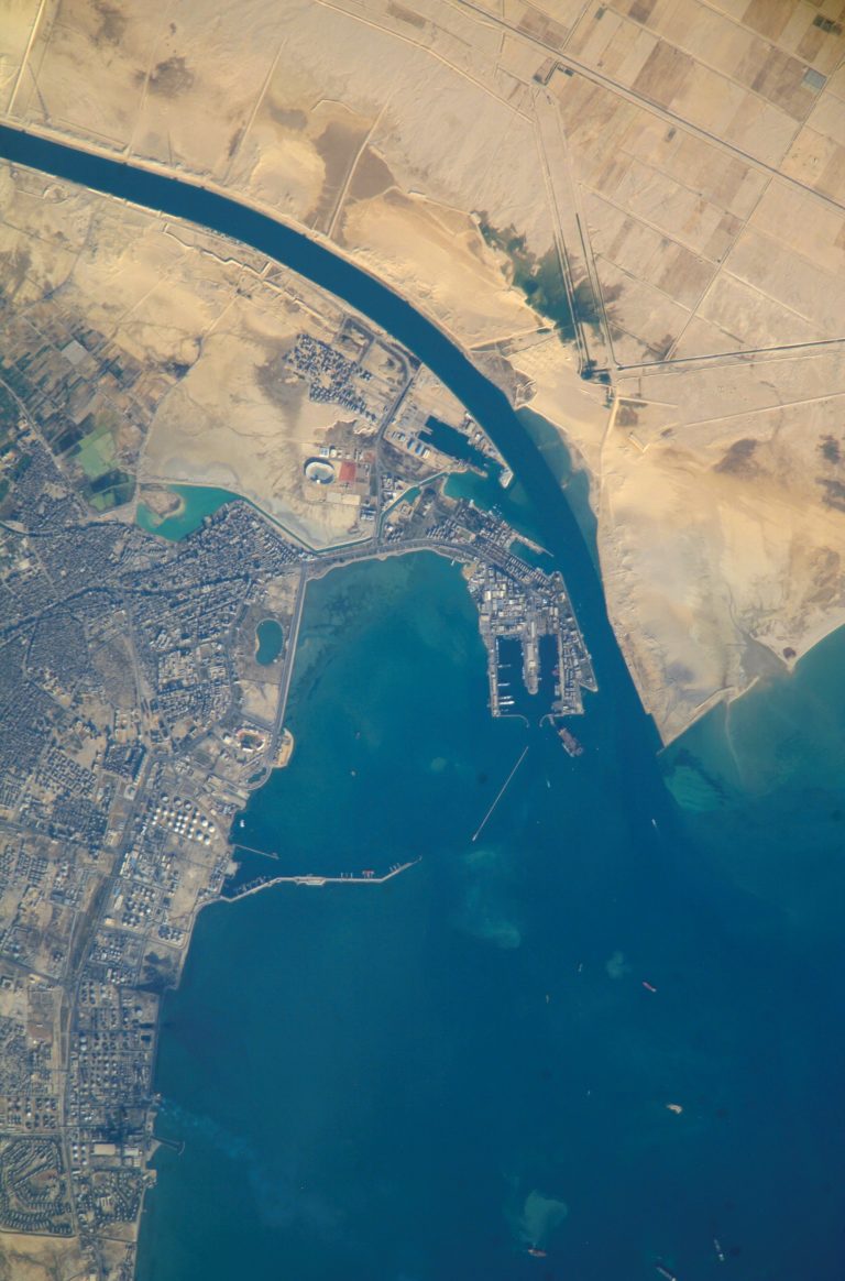 port and city which are the southern terminus of the Suez Canal that transits through Egypt and debouches into the Mediterranean Sea near Port Said port and city which are the southern terminus of the Suez Canal that transits through Egypt and debouches into the Mediterranean Sea near Port Said